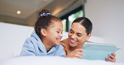 Buy stock photo Love, tablet and mother with child in bedroom to relax together, watch cartoon or online show. Tech, happy girl and mom in bed at family home for bonding, movie or streaming entertainment with parent