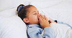 Sick, child and blowing nose in bed with allergies, congestion and sinus infection in home. Girl, tissue and sneezing in bedroom with influenza, virus symptoms and fatigue with hayfever in house