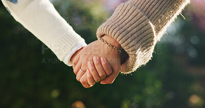 Buy stock photo Love, mom or child outdoor with holding hands, bonding together or support in childcare. Bokeh, space or family with trust, healthy relationship or parent connection for childhood development.