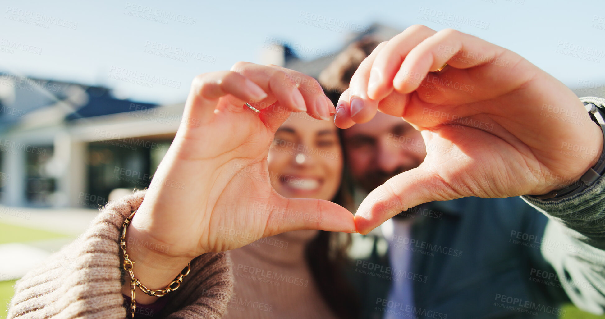 Buy stock photo Hands, couple and sign with heart at new house for love, partner support or real estate success. Portrait, smile and people with gesture for thank you, moving in and relocation of property investment