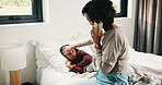 Forehead, phone call and sick girl with mother in bed together for healing, recovery or support. Check, fever and temperature of daughter with single parent woman in bedroom for healthcare concern