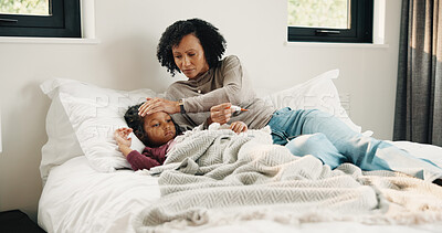 Buy stock photo Bed, fever and sick girl with mother in home together for concern, recovery or support. Checking, forehead and temperature of daughter with single parent woman in bedroom for healthcare or worry