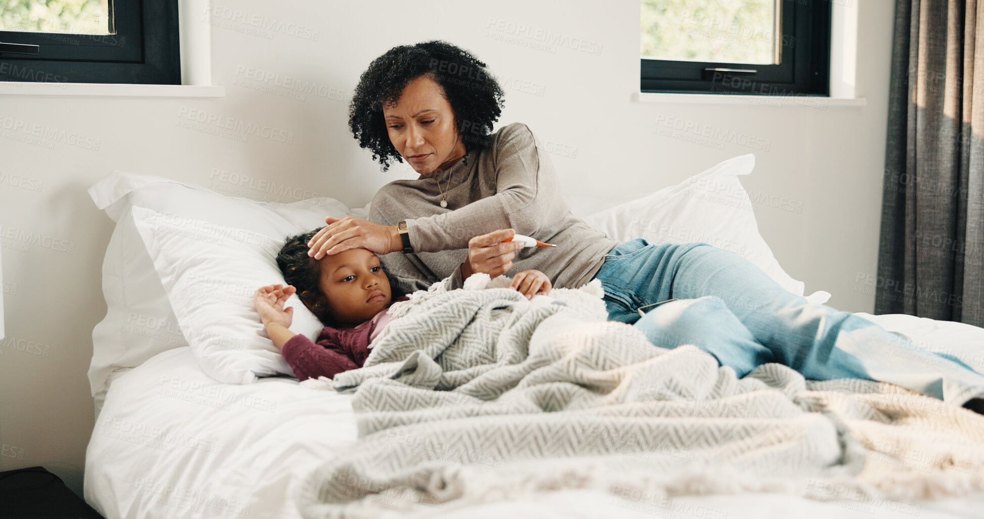Buy stock photo Bed, fever and sick girl with mother in home together for concern, recovery or support. Checking, forehead and temperature of daughter with single parent woman in bedroom for healthcare or worry