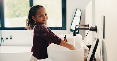 Buy stock photo Bathroom, child and washing hands for health, portrait and bacteria removal for safety in morning. Happy girl, water and cleaning at sink for hygiene wellness, germ prevention or disinfection at home