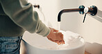 Bathroom, child and washing hands for health, wellness and bacteria removal for safety in morning. Kid, water and cleaning fingers at sink for hygiene, germ prevention and disinfection at home