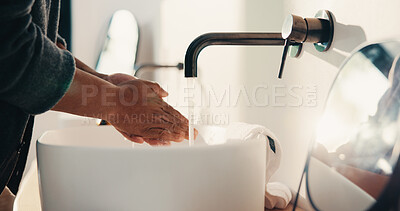 Buy stock photo Bathroom, person and washing hands for health, hygiene and bacteria removal for safety in morning. Man, water and cleaning fingers at sink for wellness, germ prevention and disinfection at home