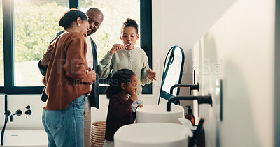 Buy stock photo Bathroom, brushing teeth and family in home together for morning routine to oral health. Cleaning, dental hygiene and parents with girl kids in apartment for bonding, learning or tooth care lesson