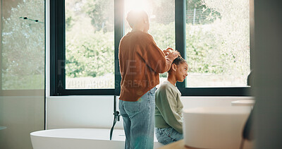 Buy stock photo Hair care, mother or child with help in bathroom, grooming assistance or morning routine for bonding. Support, flare and woman with girl for getting ready, hairstyle and happiness in family home