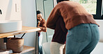 Hug, mirror and mother with daughter in bathroom of home for bonding, love or support. Morning routine, reflection and single parent woman embracing girl child in apartment for safety or security