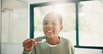 Child, brushing teeth or dental health in bathroom, portrait or oral hygiene in morning routine. Toothbrush, clean or girl at home for fresh breath with gum care, mouth wellness and smile with flare