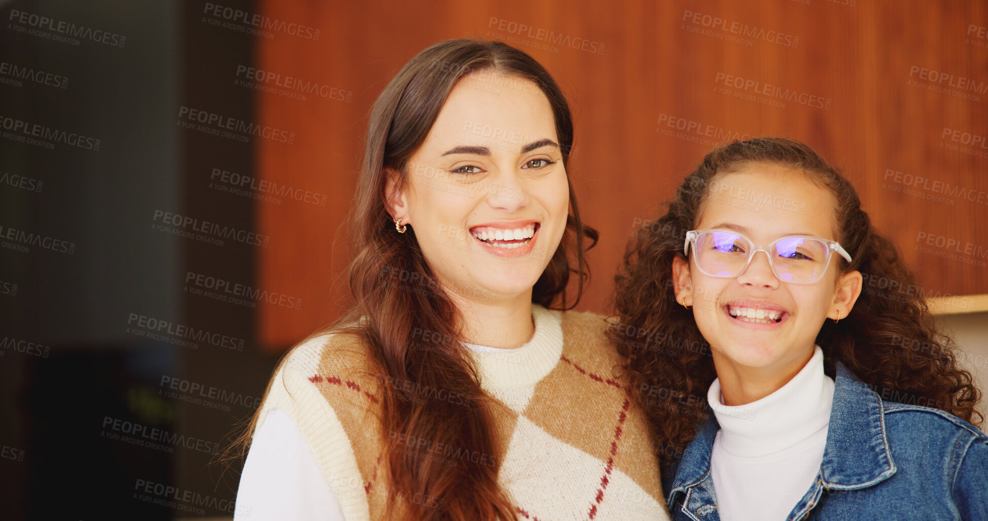 Buy stock photo Mother, daughter and smile for portrait in home with connection, love and care with glasses. Wellness, laugh and hug with woman and girl child in family house for safety, security or relax on weekend