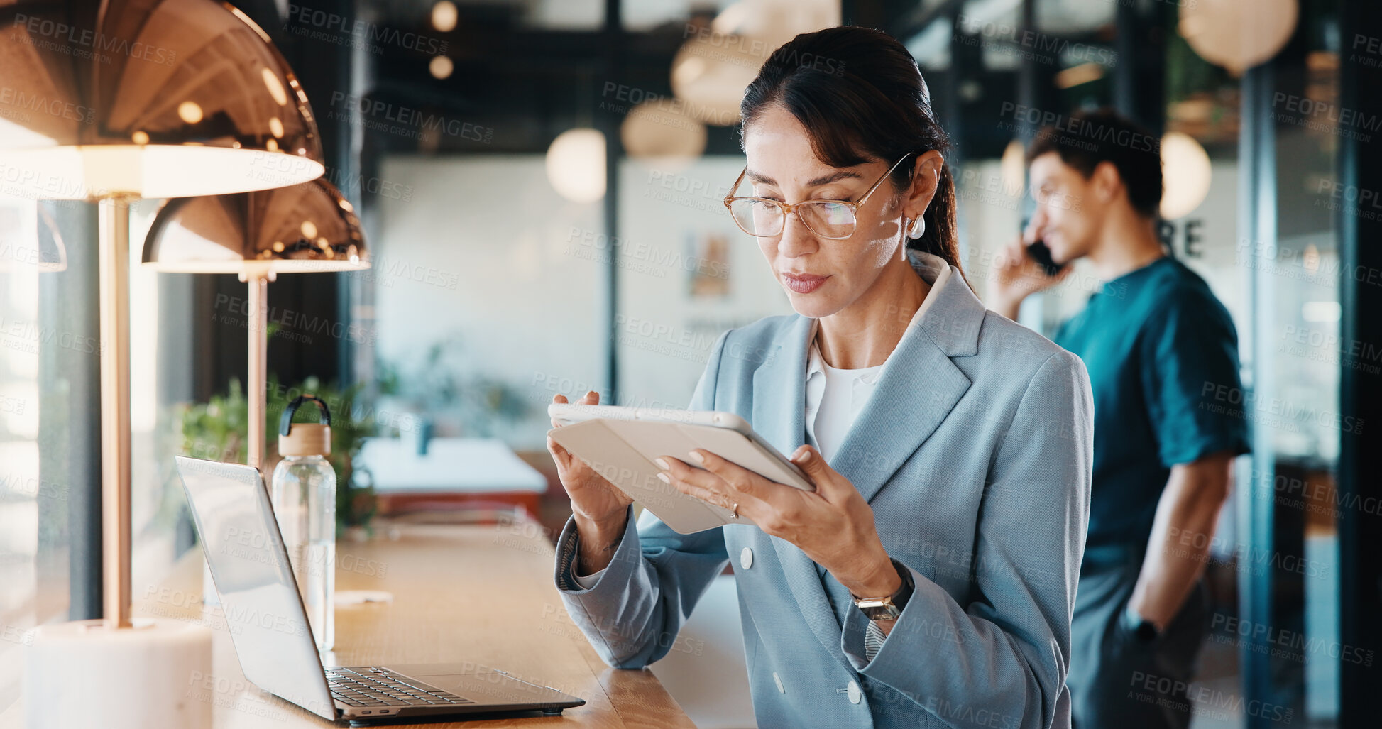 Buy stock photo Businesswoman, reading and remote work in cafe with tablet, laptop and email for HR administration. Contract worker, mature person and human resources job in cafeteria with tech, scroll and planning.