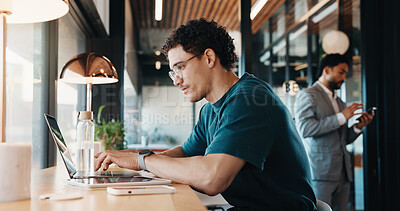 Buy stock photo Man, typing and remote work in restaurant with laptop, research or check trends for graphic design. Freelancer, person or creative designer in cafe with computer, editing project or digital campaign.