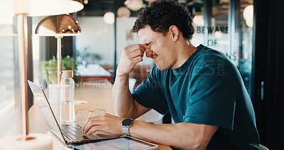 Buy stock photo Remote work, eye strain and man in bistro with laptop, burnout or pressure with headache. Migraine pain, glasses or freelancer in cafe with tech, vision discomfort or sore head with dizziness.