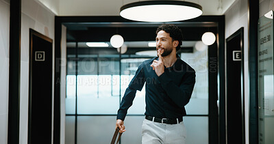 Buy stock photo Business, man and quiet gesture in office for discreet departure, leave unnoticed and finish work early. Smile, male person and walking in hallway for silent exit, avoiding attention and sneaking out