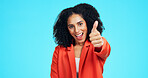 Thumbs up, portrait and business woman for promotion, thank you or support for deal in studio. Mockup, emoji and face of worker with hand gesture for approval, agreement or yes on blue background