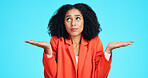 Comparison, thinking and business woman confused in studio with choice, scale balance or mockup space. Opinion, dont know gesture and female person with shrug and palm decision on blue background