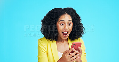 Buy stock photo Surprise, phone and happy woman in studio with shock, mobile notification or app promotion for discount. Business person, OMG and wow with tech for announcement and excited on blue background