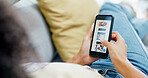 Hands, phone screen and food delivery in home with choice, online shopping and search for meal. Person, display and ux with ecommerce, digital menu and decision with mobile app on couch at apartment