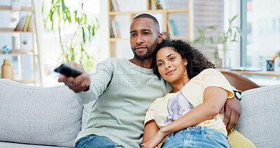 Buy stock photo Relax, home and couple watching tv on sofa with remote control for film, movie and weekend. Love, comfort and happy people in lounge with television, show and entertainment for bonding or holiday
