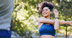 Fitness, outdoor and woman stretching with personal trainer for cardio, workout or training. Sports, health and female athlete with coach and arm warm up for exercise or muscle flexibility in park