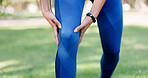 Fitness, nature and hands of person for knee pain, injury or accident with workout outdoor. Health, sports and athlete in park for exercise with massage for arthritis, osteoporosis or muscle sprain.