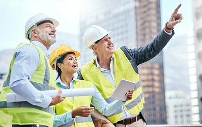 Buy stock photo Happy people, civil engineer or pointing with tablet in city for architecture or construction on site. Group, employees or builders with technology or hard hat for urban property development in town