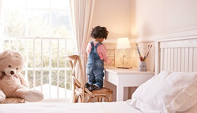 Buy stock photo Back, kid and girl in home, abacus for learning and education for growth, knowledge and toddler. Apartment, game and child development in bedroom, maths and future with toy, counting and youth