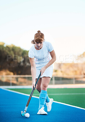 Buy stock photo Outdoor, hockey and woman with stick for practice, fitness or training for tournament at sport field. Serious, athlete and person with equipment for game, wellness and exercise for competition