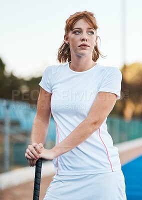 Buy stock photo Thinking, athlete and woman with hockey stick at sports field, fitness and planning for competition. Serious, player and person with equipment for game, reflection and ideas for tournament or match