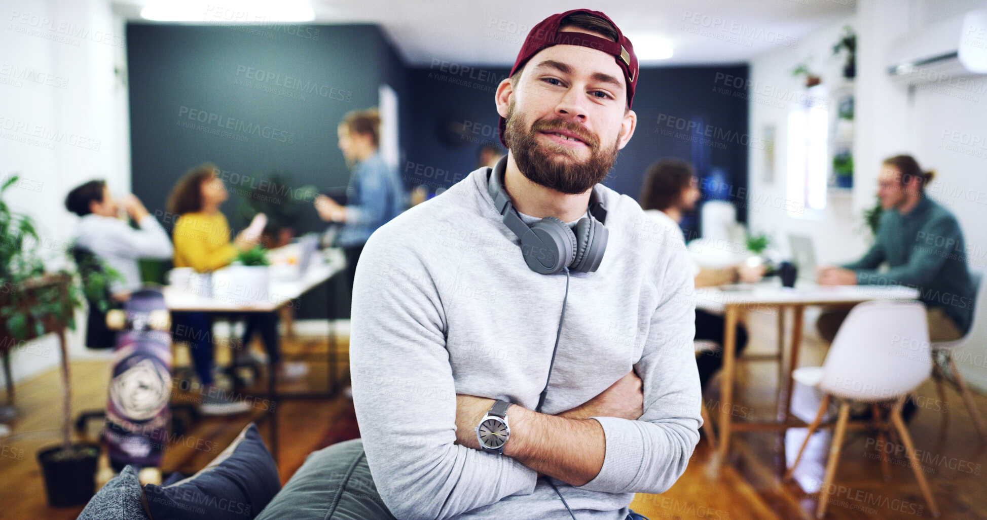 Buy stock photo Arms crossed, headphones and portrait of man at tech startup for about us, ambition or development. Creative, friendly and small business innovation with happy designer in workplace for career