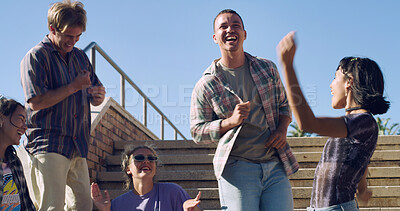 Buy stock photo Dance, laughing and friends in city with excited, fun and happy hangout for weekend. Singing, celebration and group of people chilling on stairs for bonding, gathering and enjoying holiday or break