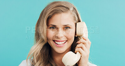 Buy stock photo Business, happy woman and telephone call in studio for admin, portrait and listening to contact. Retro landline, smile and receptionist talk, connection and schedule appointment on blue background
