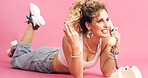 Style, telephone and woman in studio for phone call, communication or relax with retro outfit. Happy, chat and person with landline for gossip conversation with vintage fashion by pink background.