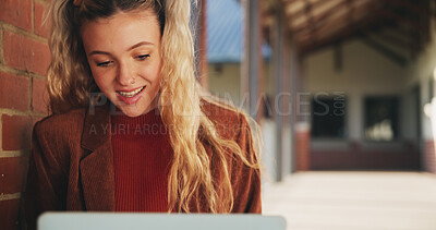 Buy stock photo Laptop, education and woman at university for research on scholarship, curriculum or learning. Happy, computer and female student with email for college exam, test or assessment results on campus.