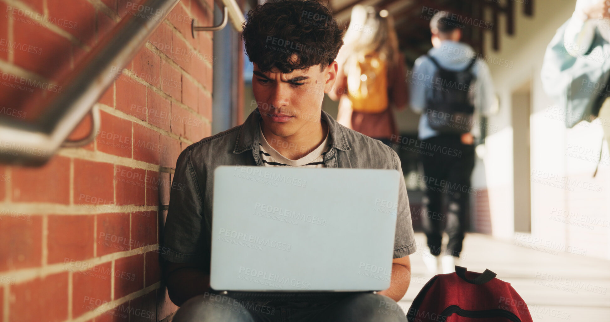 Buy stock photo Laptop, confused and man at university for research on scholarship, curriculum or learning. Doubt, computer and male student with email for bad exam, test or education results on college campus.