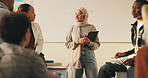 Tablet, muslim woman and teacher in classroom at high school with tips for study, learning or test. Happy, islamic person and educator with technology for attendance of students for academic support.