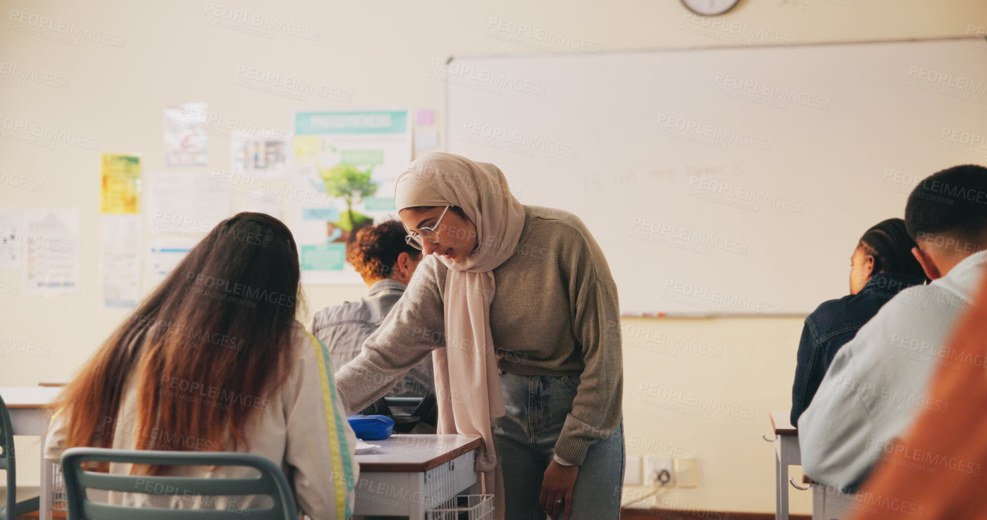 Buy stock photo Teacher, classroom and woman with student for help, support or exam results in science subject. Knowledge, education and educator with teaching lesson, study advice or guidance for learning in school