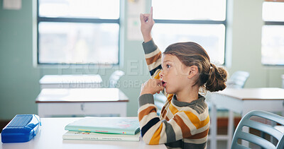 Buy stock photo Question, education and exam with girl in classroom for test, child development and knowledge. Hand raised, thinking and lesson with student on school campus for learning, curriculum and study course