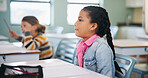Child, learning and lesson in classroom, education and listening to teacher for academic development. Elementary school, students and kids with cognitive growth, knowledge and assessment explanation