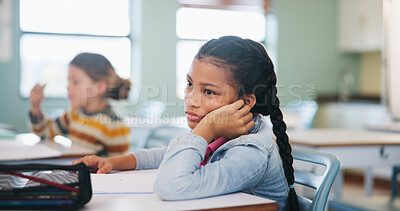 Buy stock photo Bored, education and tired girl in classroom for test, child development and knowledge fatigue. Assessment, burnout and lesson with student on school campus for learning, curriculum and study course