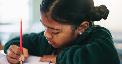 Buy stock photo Writing, learning and quiz with girl in classroom for test, child development and knowledge. Education, notebook and lesson with student on school campus for assessment, curriculum and study course