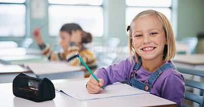 Buy stock photo Portrait, smile and exam with girl in classroom for test, child development and knowledge. Education, notebook and lesson with student on school campus for assessment, curriculum and study course