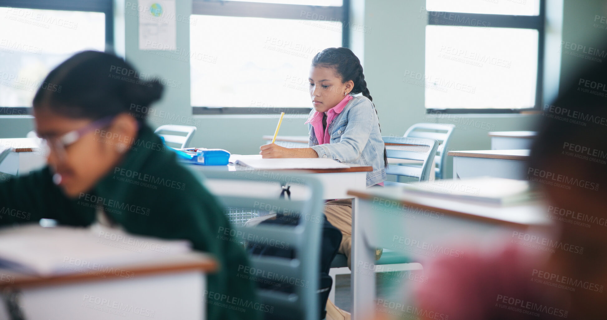 Buy stock photo Writing, education and exam with students in classroom for test, child development and knowledge. Academy, notebook and lesson with kids on school campus for learning, curriculum and study course