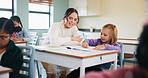 Teacher, writing or child with help in classroom, task assistance or advice for academic development. Teaching, educator or girl with syllabus support for knowledge, education or learning in school