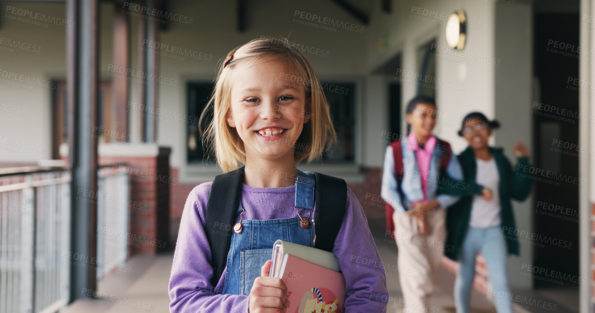 Buy stock photo Outdoor, child and student with books at school, learning and confident with academic development. Learner, portrait and kid with backpack for cognitive growth, education and pride for knowledge