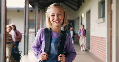 Buy stock photo Child, portrait and student with backpack at school, learning or confident with academic development. Learner, outdoor and kid with smile for cognitive growth, education and pride for knowledge