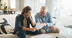 Reading, man or senior father with paper on couch, financial crisis or invoice for university fees. Review, old person or son with scholarship termination for debt, funding planning or worry in home