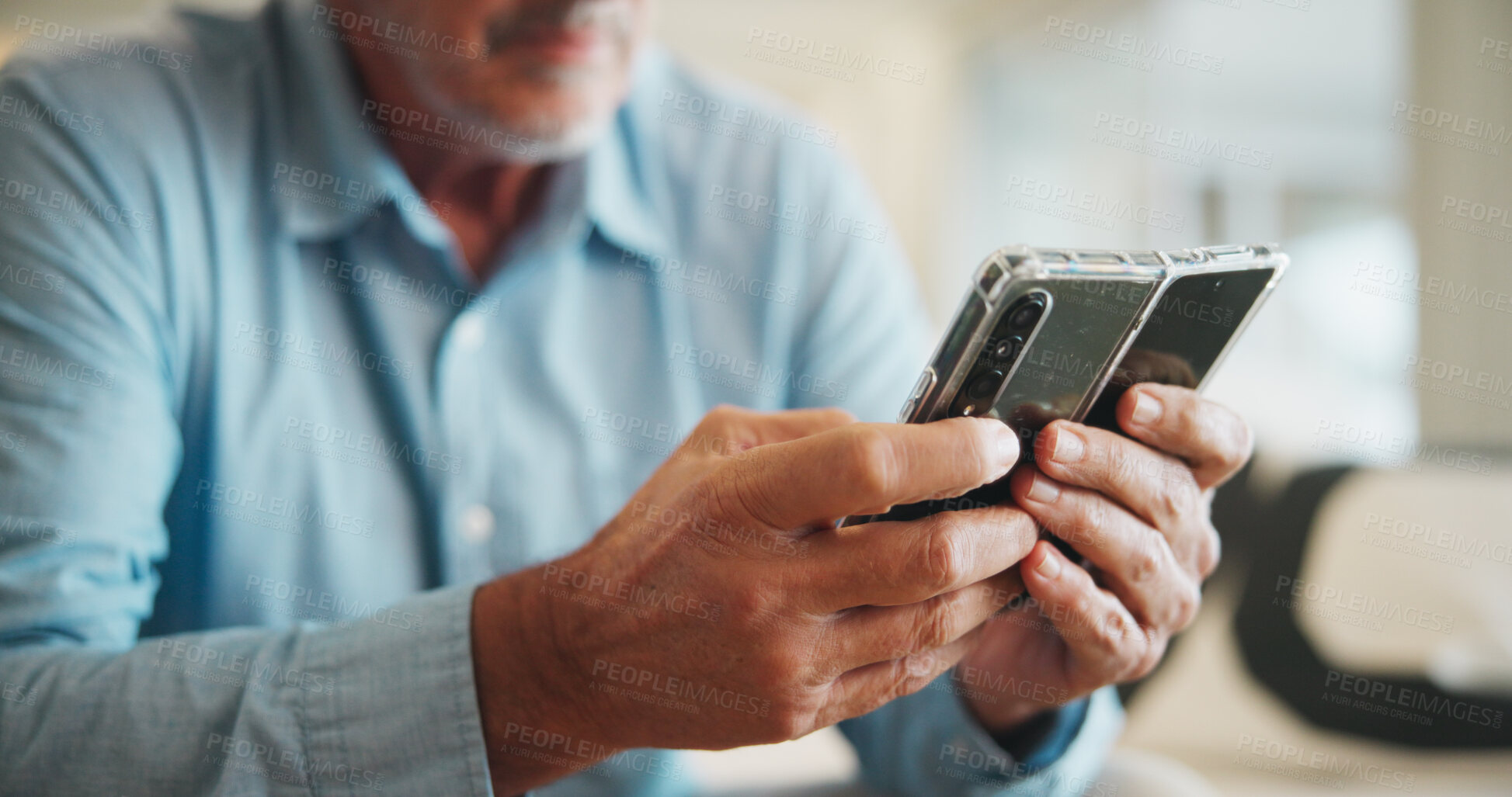 Buy stock photo Hands, phone and old person in home for communication, reading ebook or games on sofa. Relax, texting and pensioner on mobile app for connection, social media or subscription service for weekend