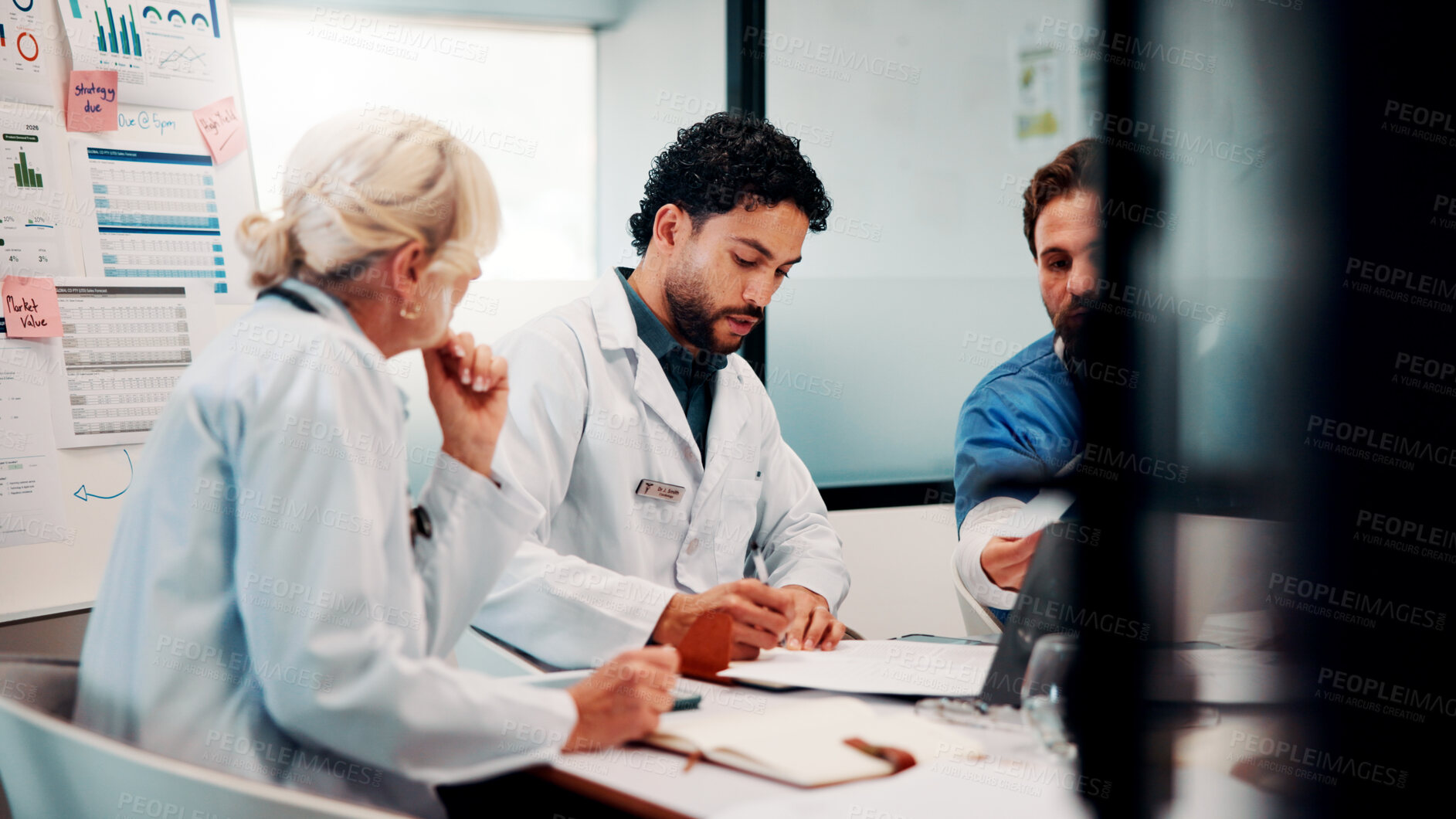 Buy stock photo Hospital, meeting and doctors with documents in boardroom for funding, budget and finance review. Healthcare, teamwork and people with statistics for financial report, medical grant and planning